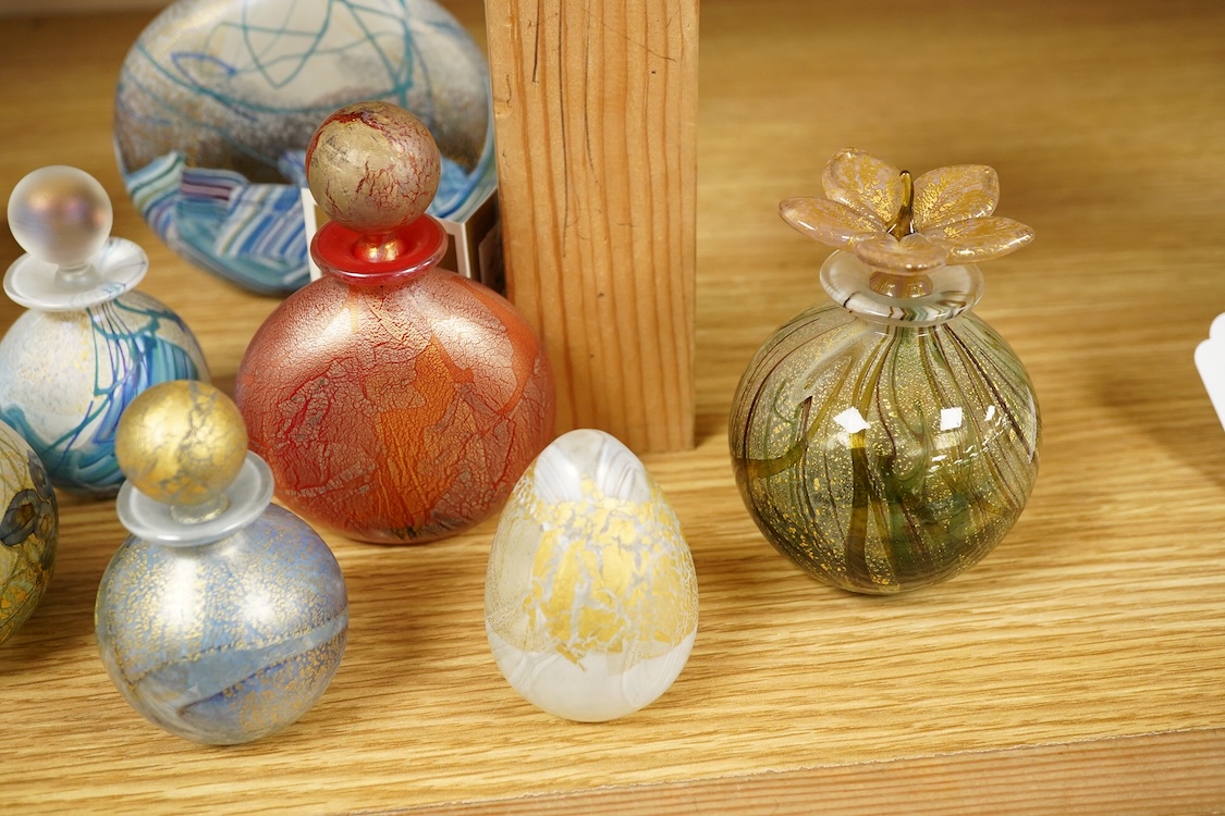 A collection of thirteen Isle of Wight scent bottles, tallest 15cm